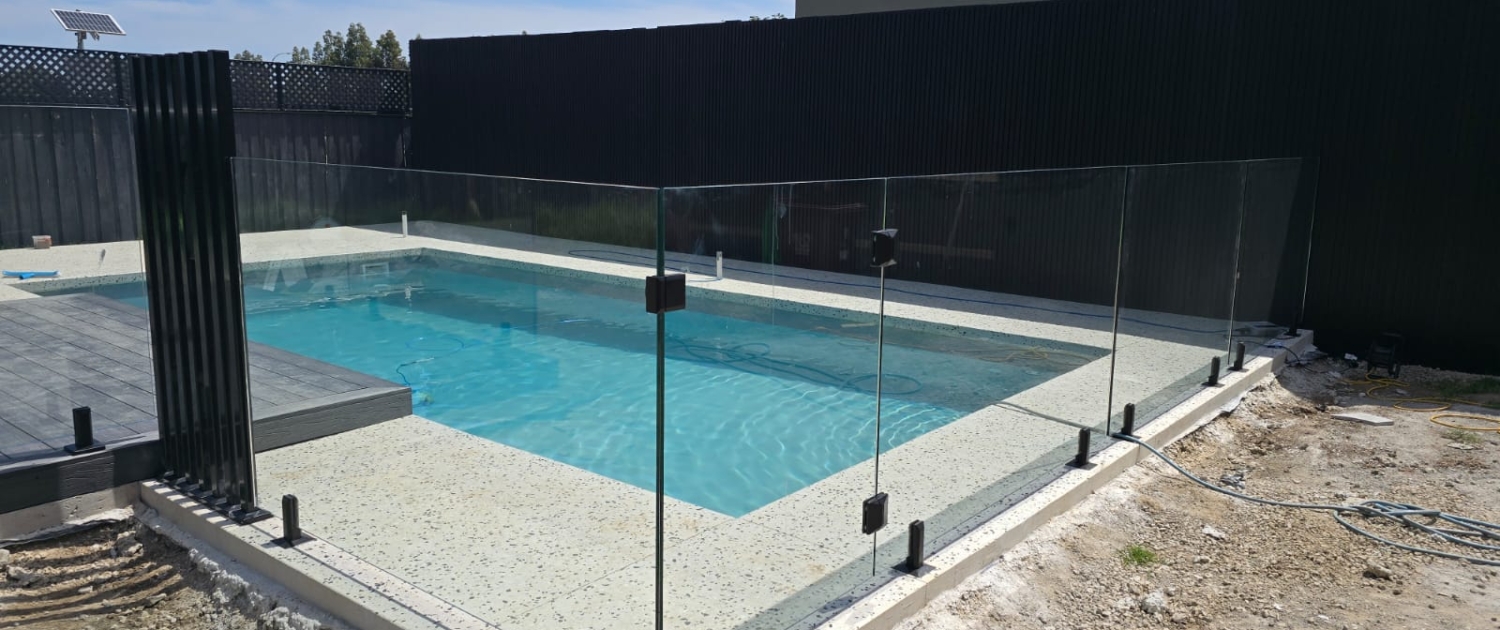 Custom-designed wooden fence in Melbourne by Melbourne Fencing Service, combining durability and aesthetic appeal for residential properties