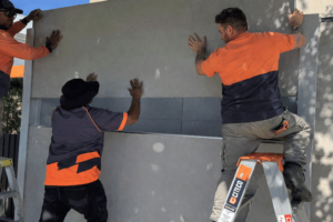 GUYS INSTALL THE MODJULAR WALL